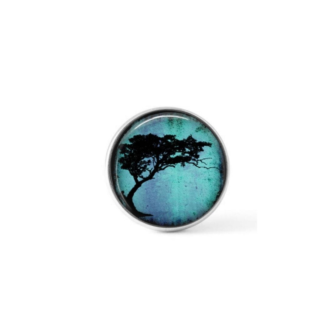 Cabochon à bouton pression pour bijoux interchangeables avec un thème de tortillis d'acacia sur fond turquoise vif