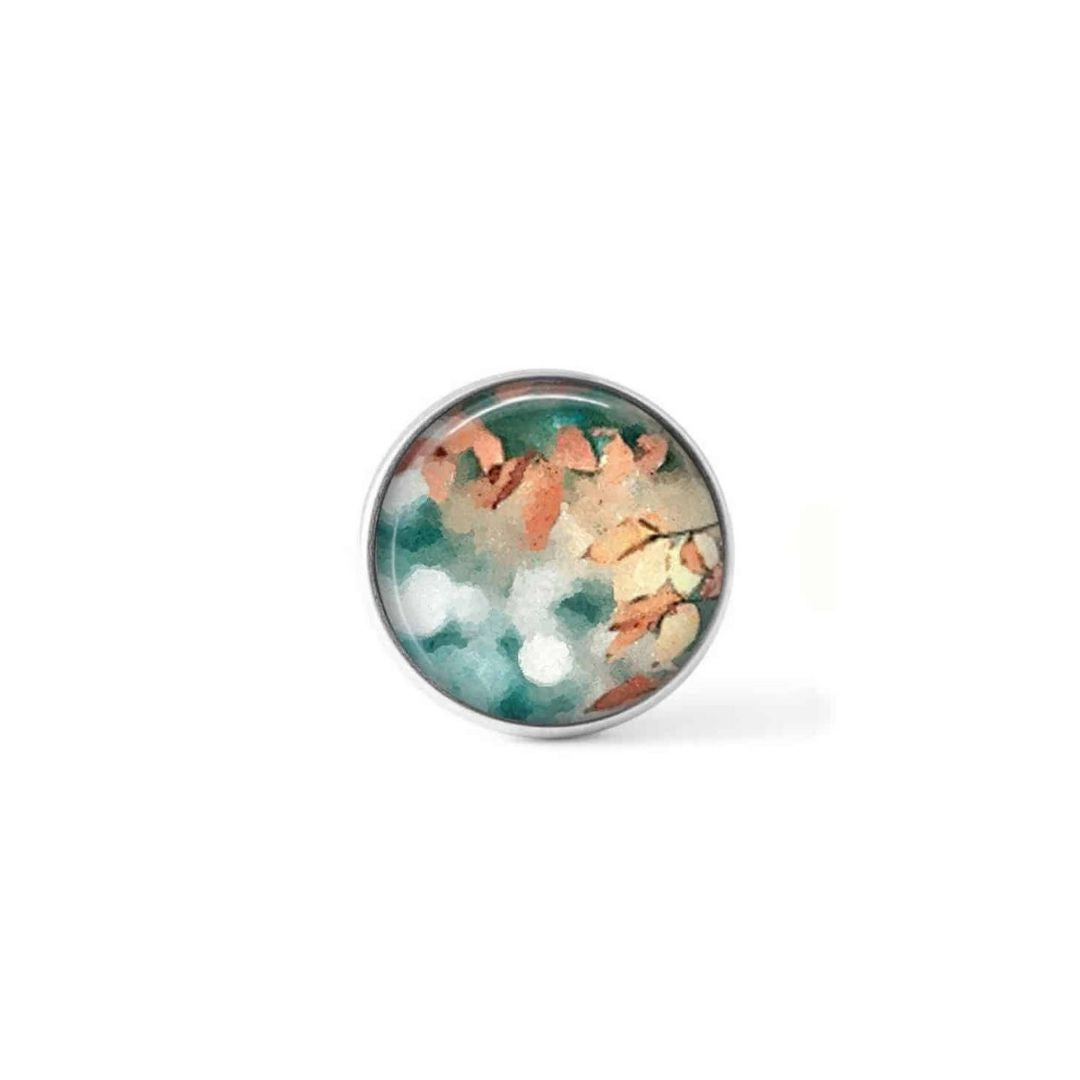 Bouton cabochon clipsable pour bijoux interchangeables avec un motif abstrait feuillage rouille et turquoise