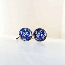 Cuff links with a blue Damask pattern.