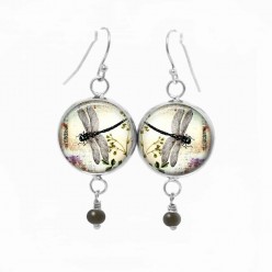 Dangle earrings with a dragonfly and foliage theme
