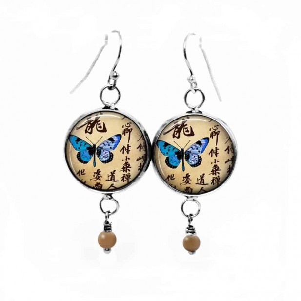 Boucles d'oreilles fantaisie pendantes avec le thème Papillon d’Asie bleu turquoise