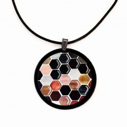 Slate necklace with an earth-tone beehive Hexagons theme