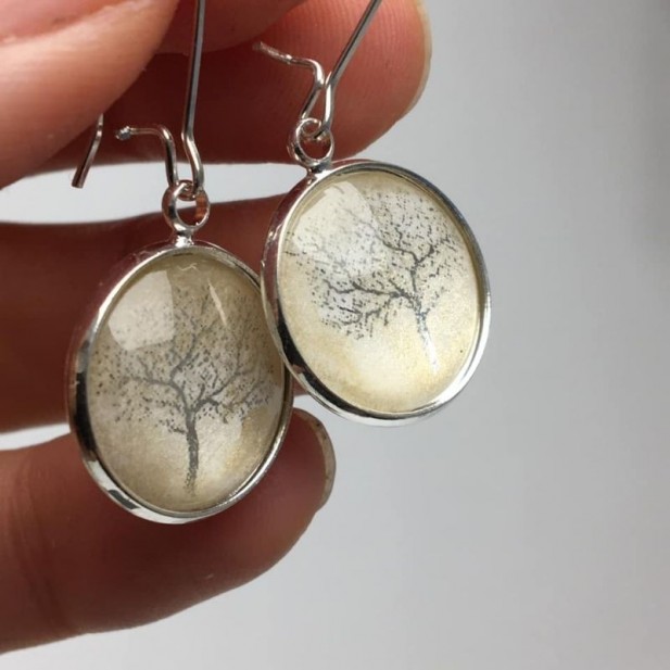 Silver tree of life and gold glitter gangle earrings