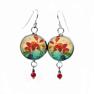 Dangling earrings with a red leaf hebarium pattern