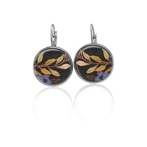 Leverback earrings with floral boho pattern on a black background - branches and blue flower