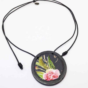 Slate necklace with floral Boho pattern on black background - Pink