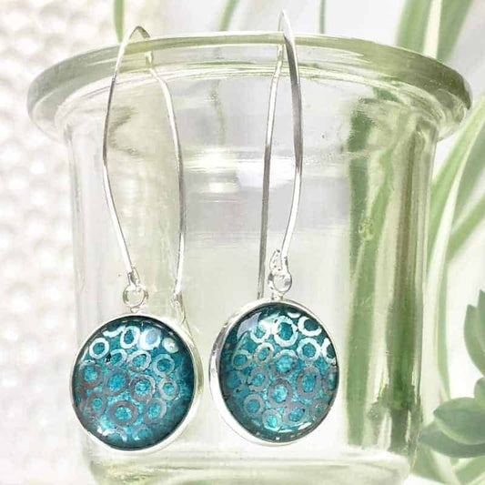 Boucles d'oreilles pendantes cercles argents et aquarelle turquoise