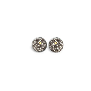 Earrings from the Yule collection in black, white and gold circles and dots