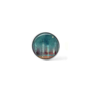 Clip-on cabochon button for interchangeable jewelry with an abstract "forest and moon" pattern in brown and turquoise