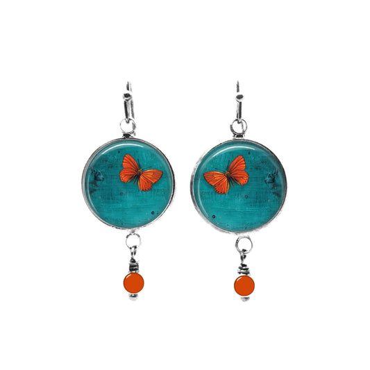 Pendants d'oreilles avec perles à thème papillon orange sur fond turquoise foncé