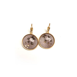 Lever earrings with golden butterflies and pink watercolor background