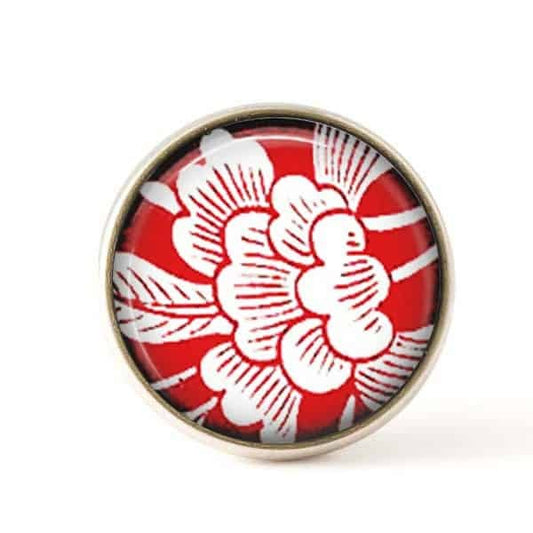 Bouton / Cabochon pour bijoux interchangeables- thème fleurs japonisantes sur fond rouge.